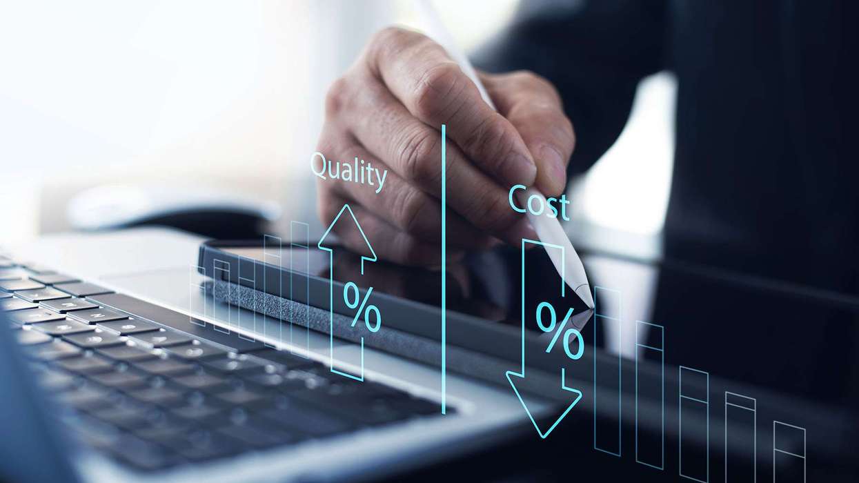 A graphic of quality increasing while cost decreases over a man in a suit writing on a tablet.