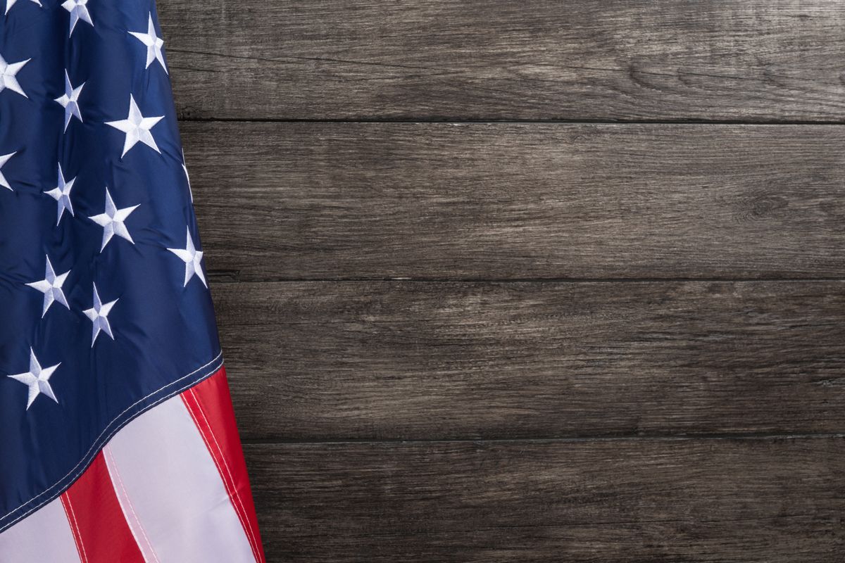 American flag against a wooden background
