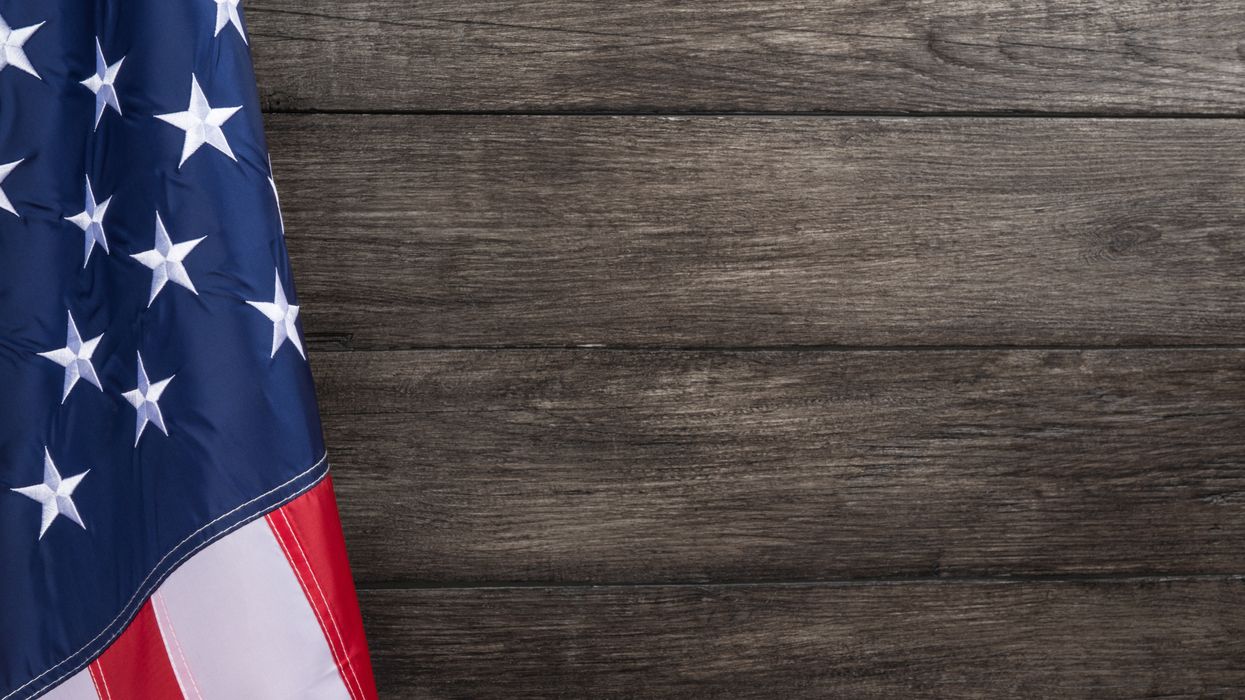 American flag against a wooden background