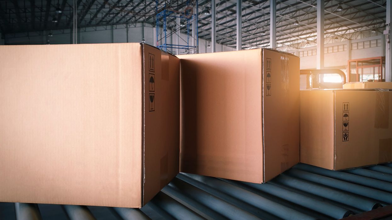 boxes on conveyor belt in warehouse