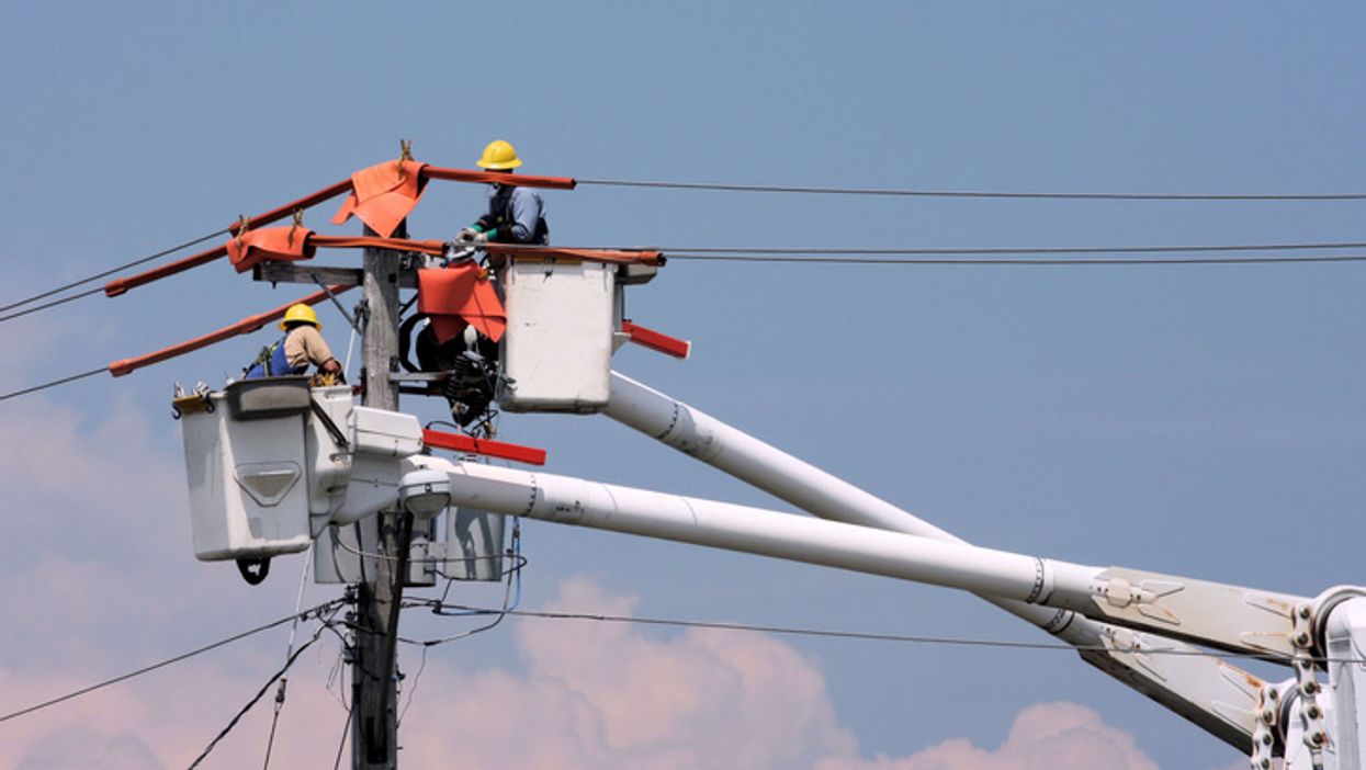 Electric professionals working