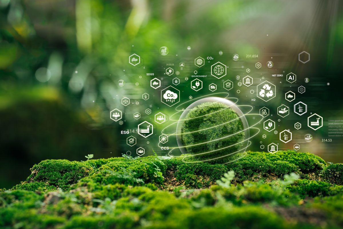 Green globe made up of moss with icons related to sustainability