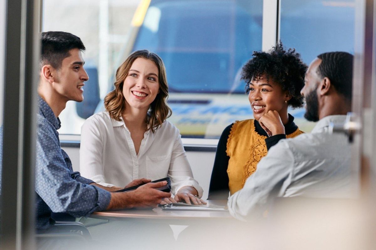 Group of people in a conference room.