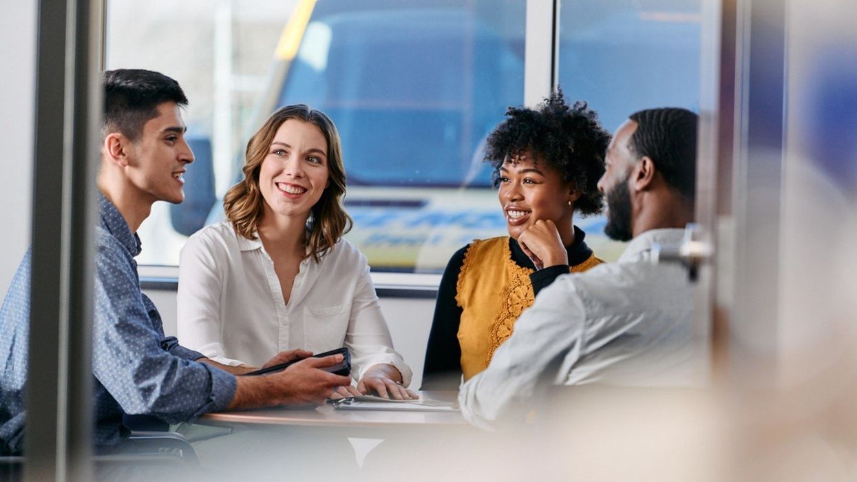 Group of people in a conference room.