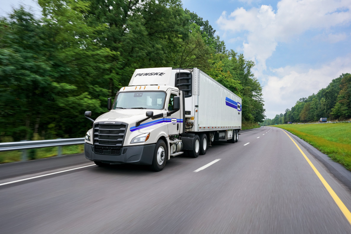 Image of Penske Logistics truck driving on road
