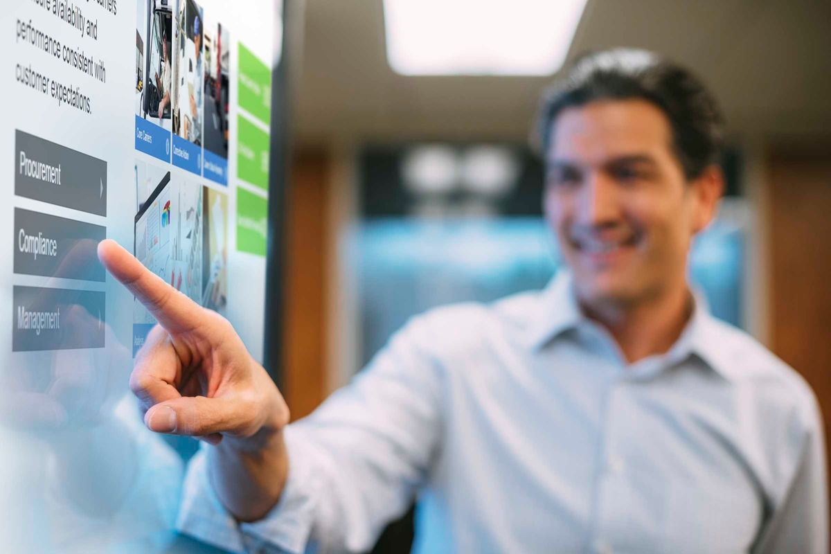 man using touch screen