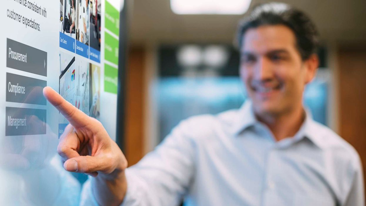 man using touch screen