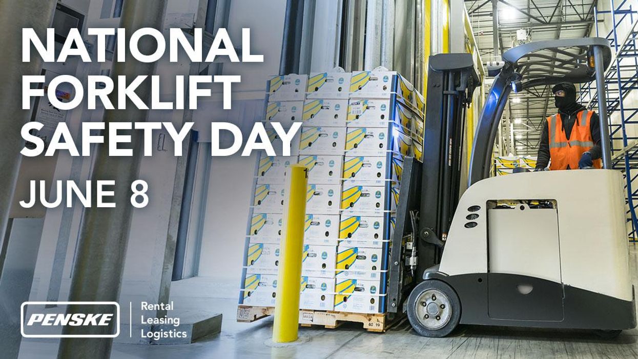 penske associate driving forklift in warehouse