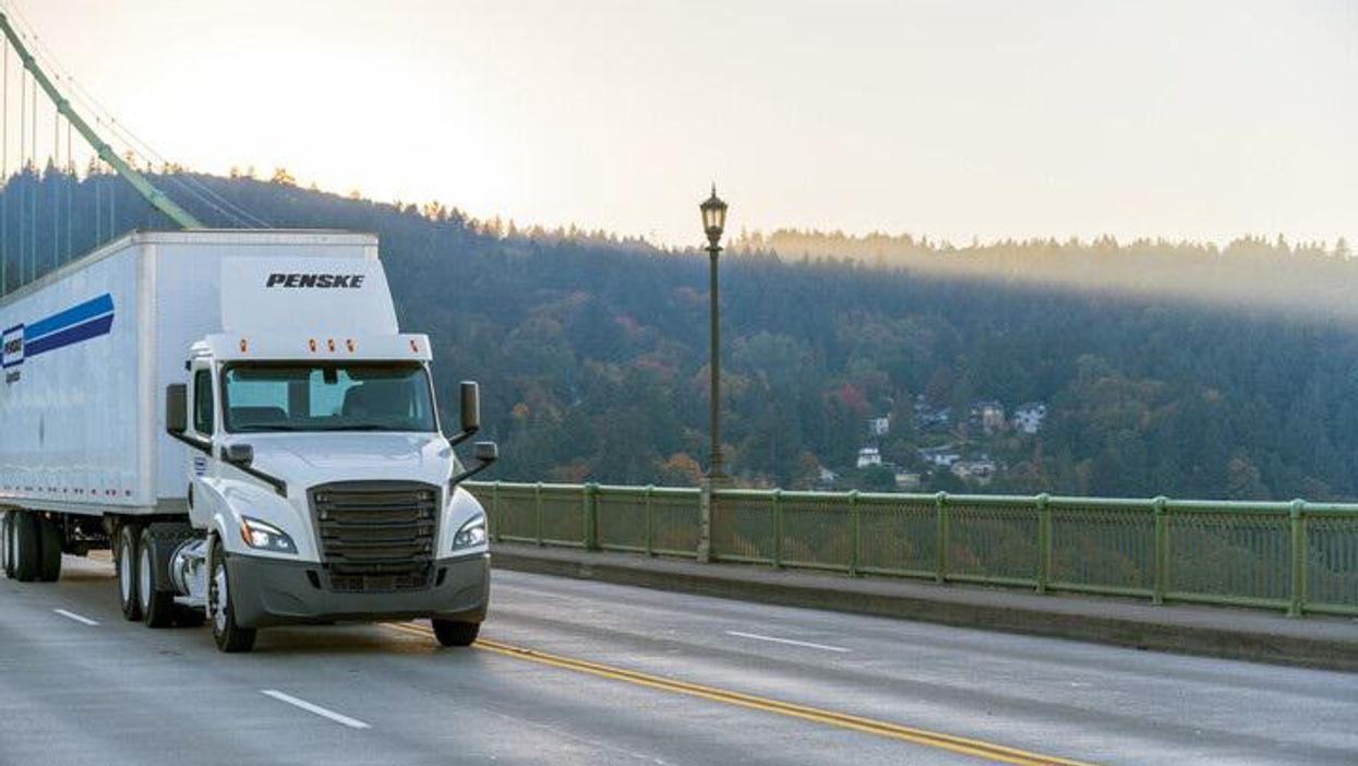 Penske truck on bridge