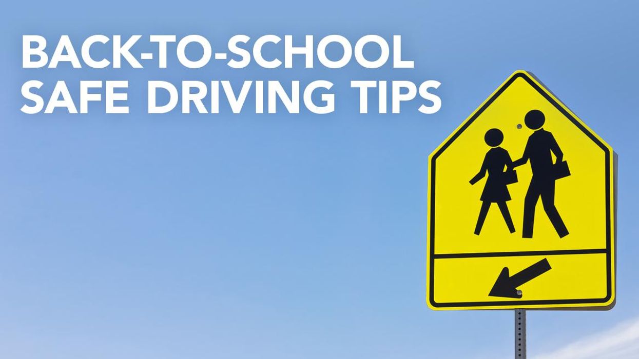 people walking street sign