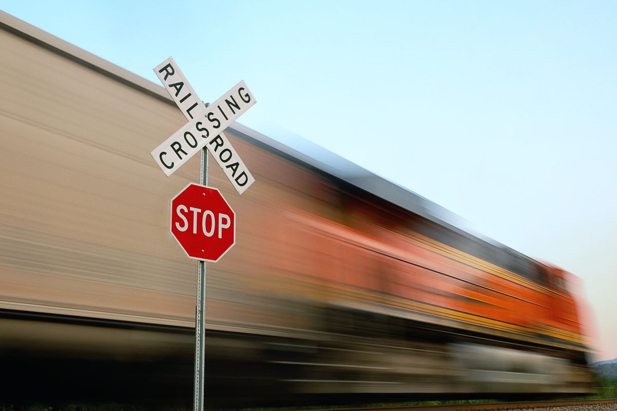 Railroad crossing and stop sign