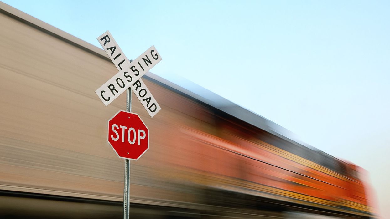 Railroad crossing and stop sign