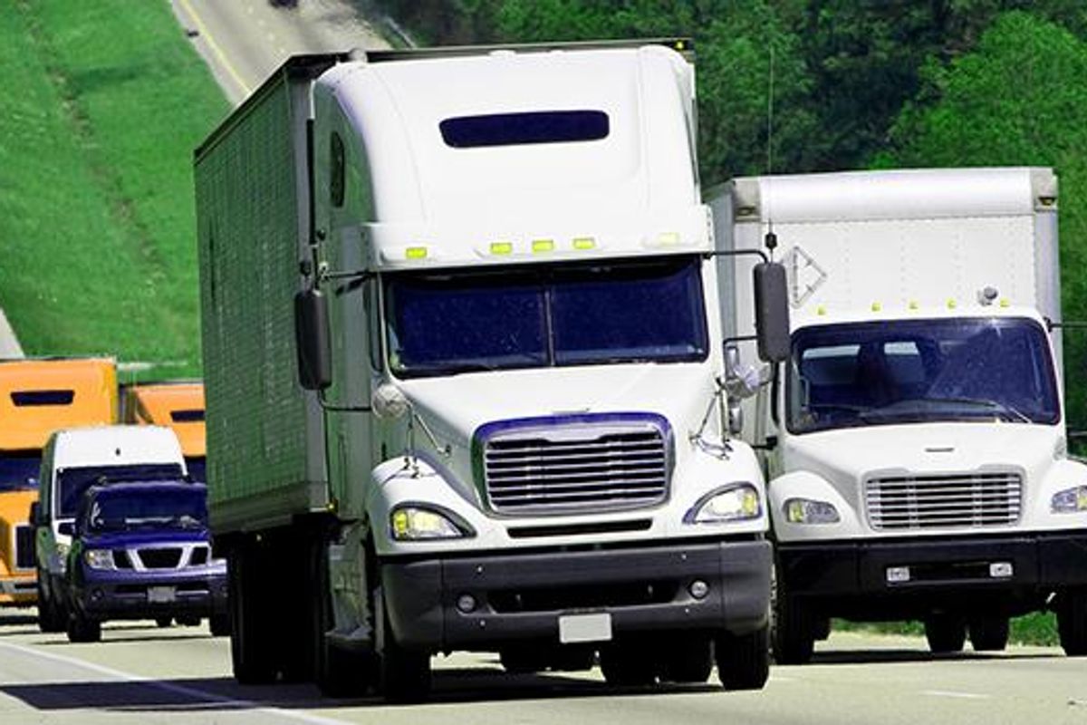 Trucks driving on the highway.