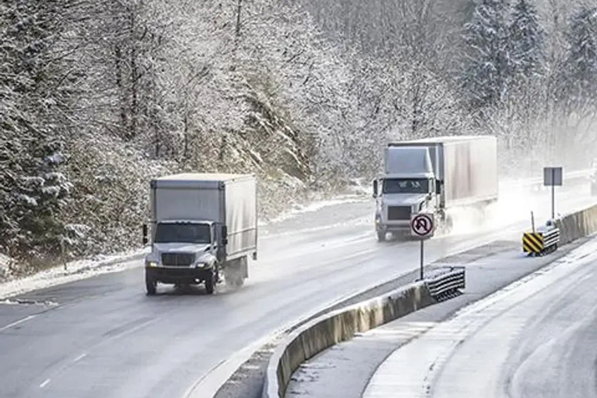 trucks driving on winter roads