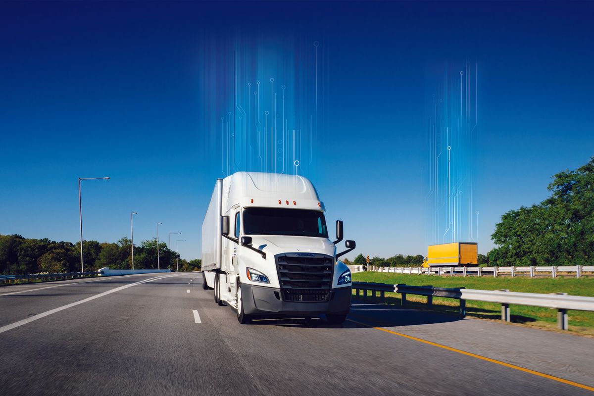 White truck driving down the highway