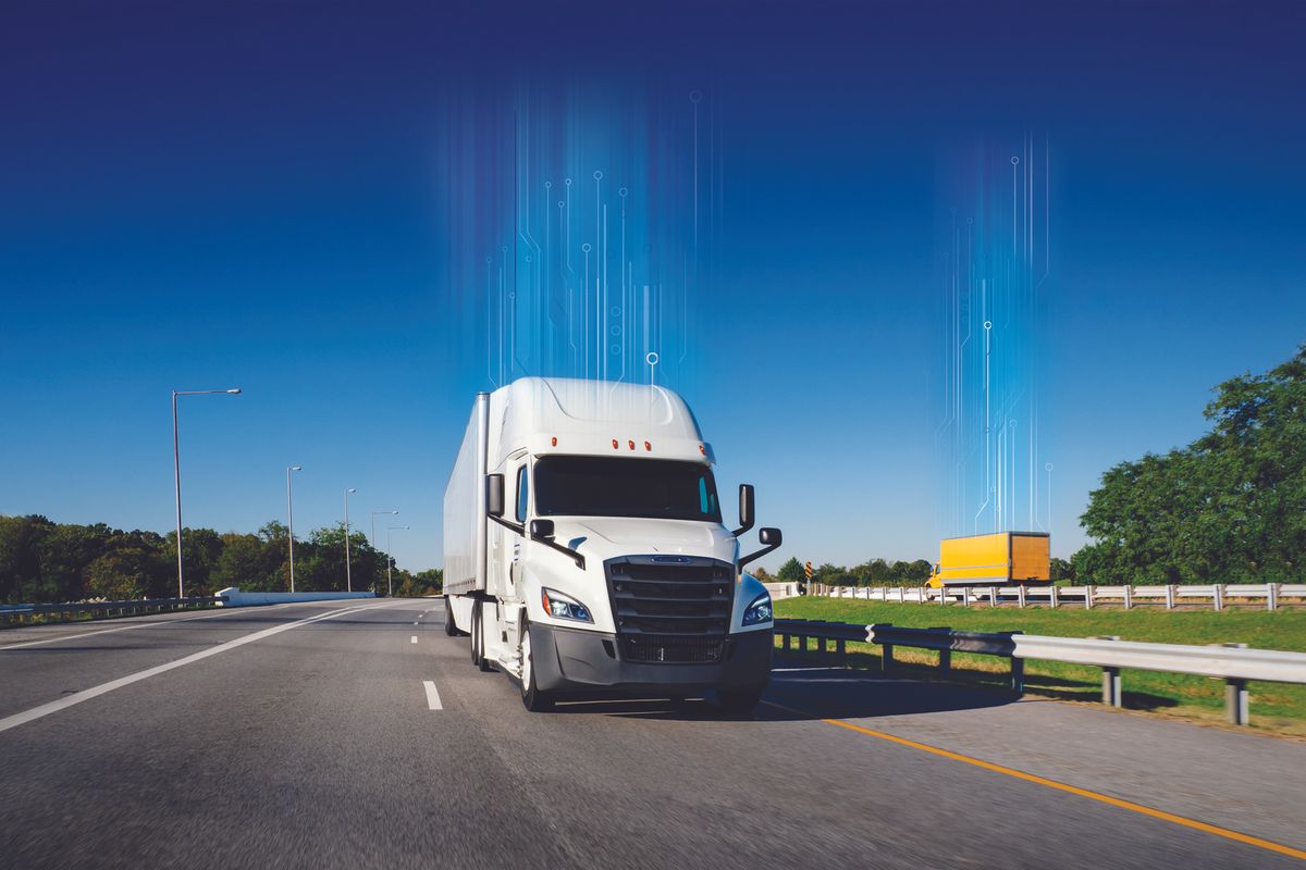 White truck driving down the highway