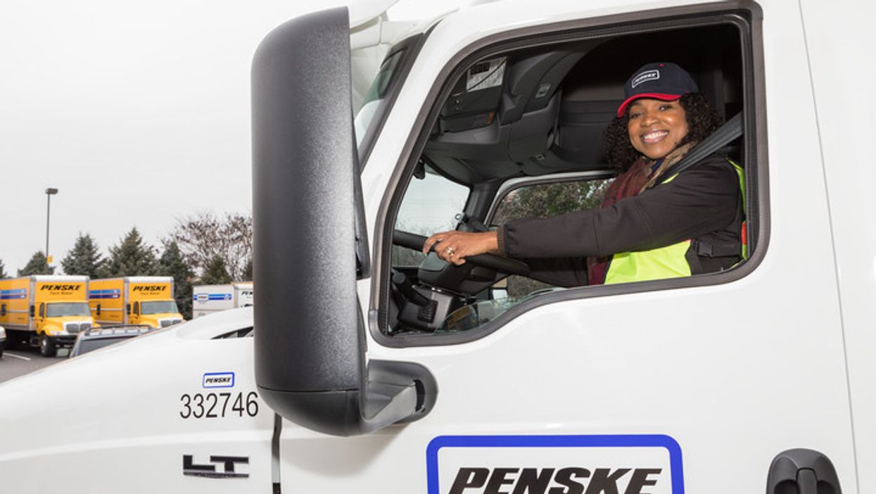 Woman in Penske truck