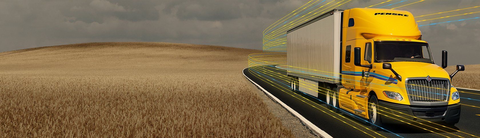 yellow truck on the road
